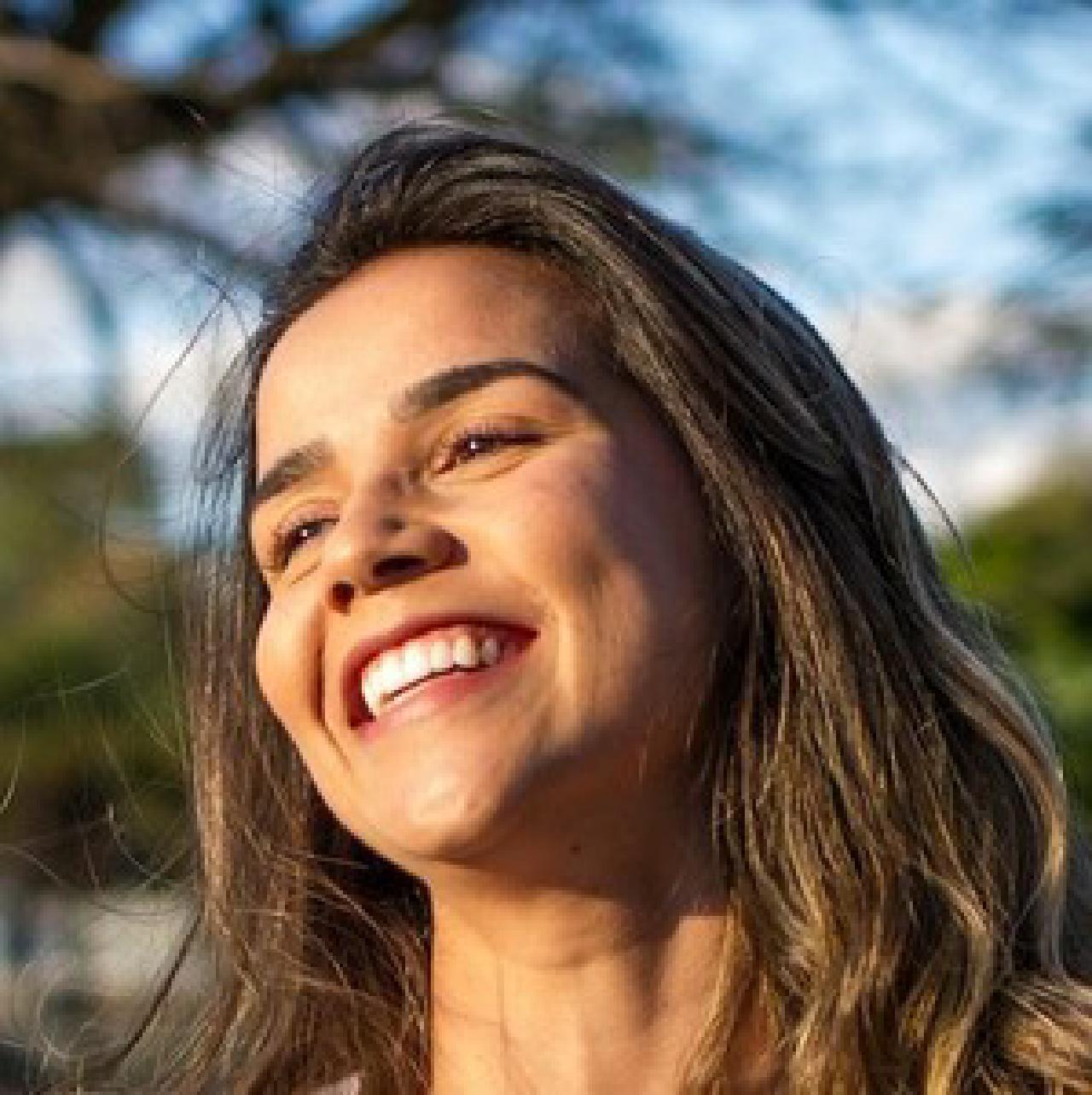 Can a neural network distinguish a smile from a frown?